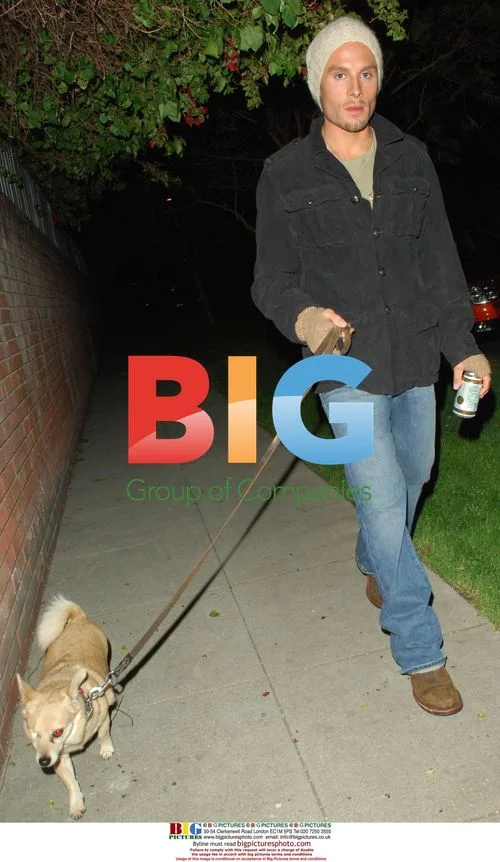 Matt Felker takes dog for walk