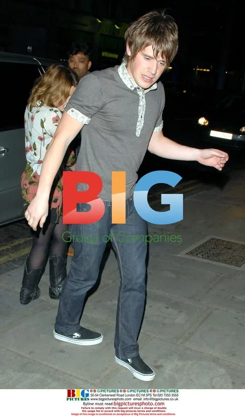 Arctic Monkeys Guitarist Jamie Cook with Model Katie Downes