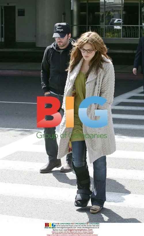 Mandy Moore Lands at LAX with New Man
