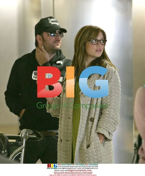 Mandy Moore Lands at LAX with New Man