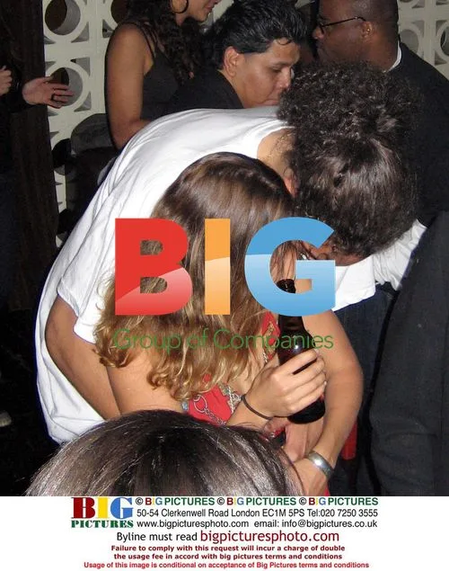 Joakim Noah kissing girlfriend