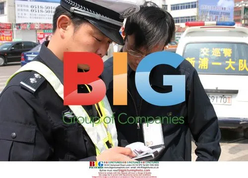 Policeman Using Multi-Functional Cell Phone