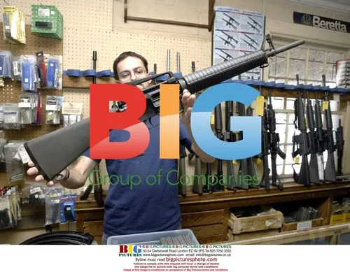 Salesman demonstrates Cold Match target gun