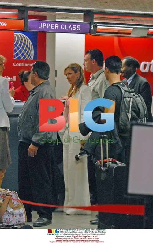 Heather Mills McCartney and Jonathan Roberts depart LAX