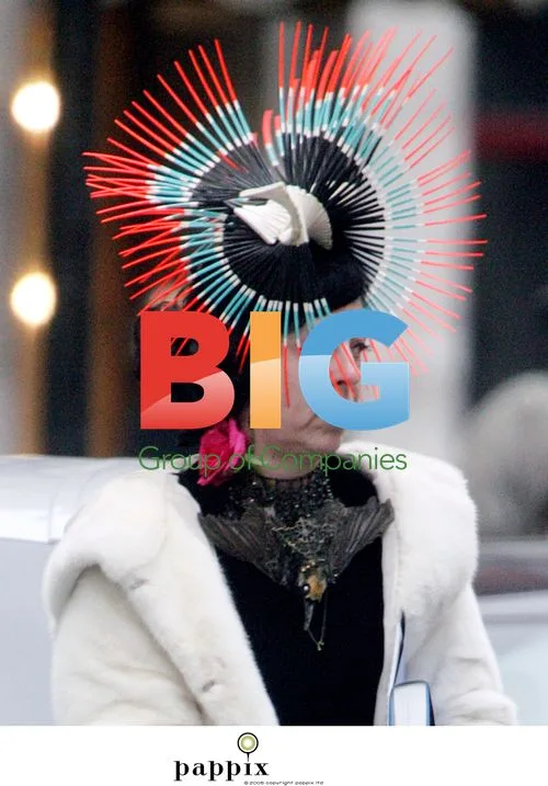 Isabella Blow Wears Peacock Headpiece