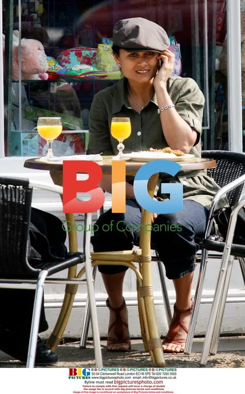 Troy Titus-Adams Chats on Phone During Lunch