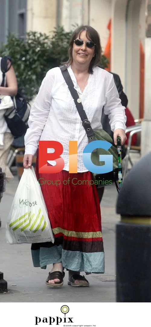Kathy Burke out in North London with walking stick