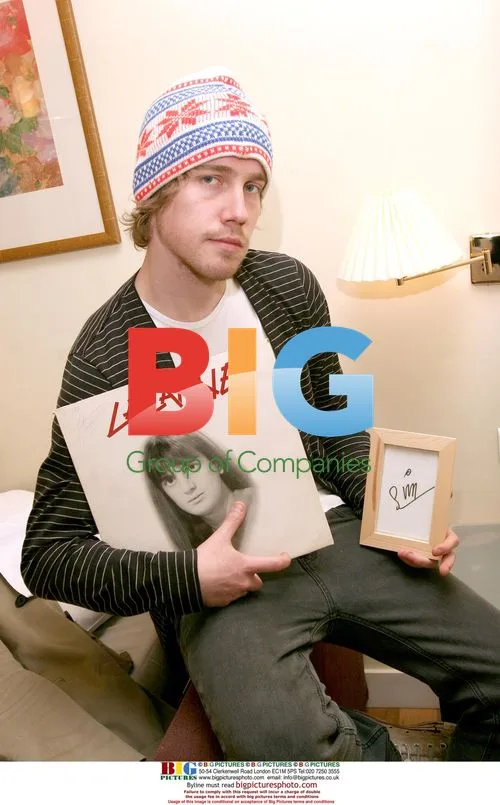Julien poses with favorite object