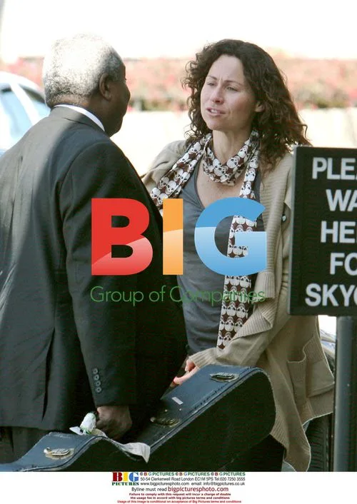 Minnie Driver Departs LAX with Guitar