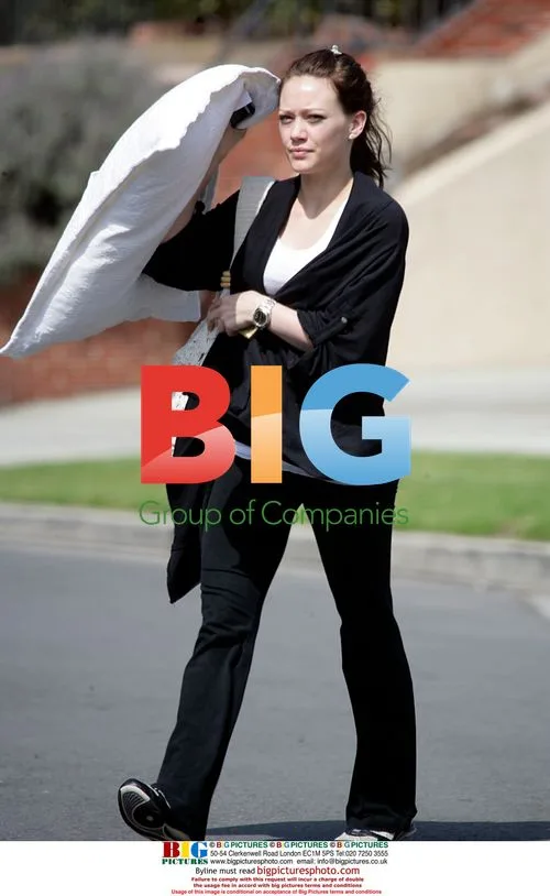 Hilary Duff Holds Large Pillow in LA