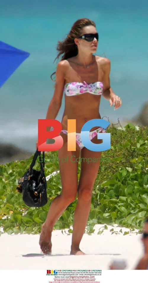 Rachael Flintoff Sunbathes on Beach