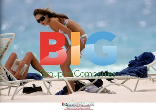 Rachael Flintoff Sunbathes on Beach