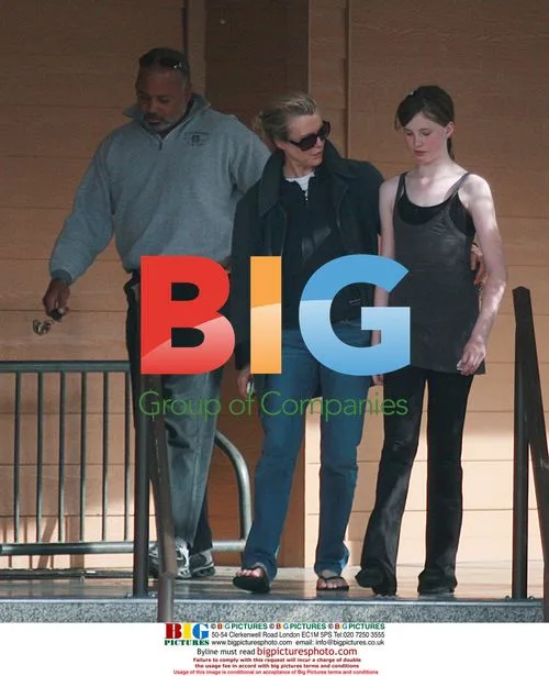 Kim Basinger and daughter out with bodyguard