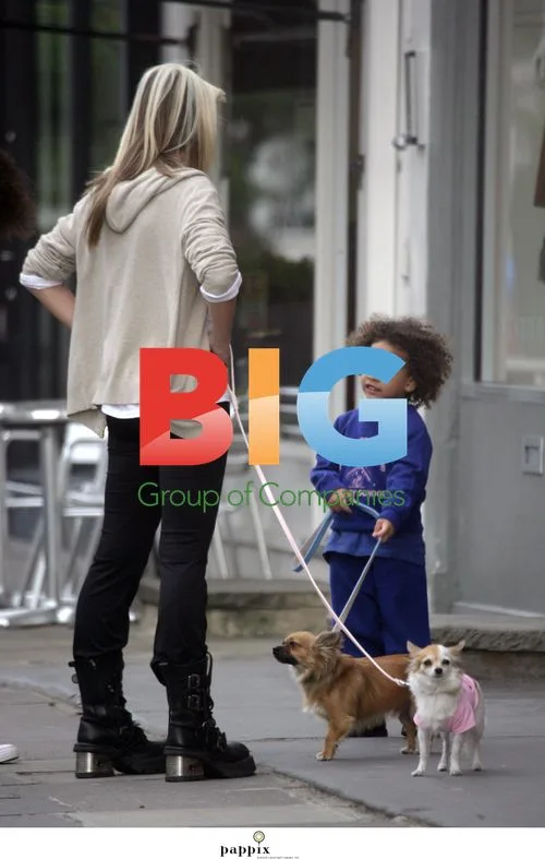 Caprice Bourret and her miniature dogs in London