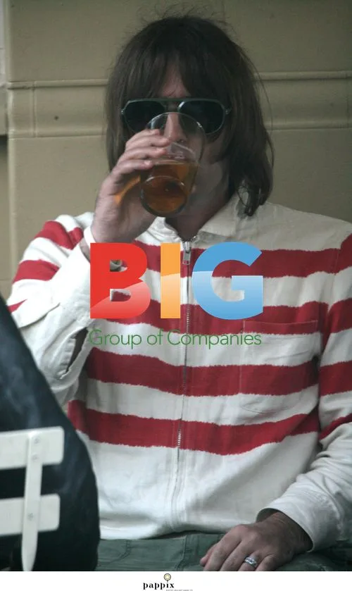 Liam Gallagher with brother Paul in North London
