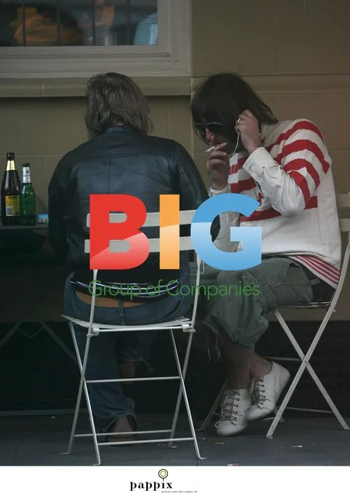 Liam Gallagher relaxes with brother Paul