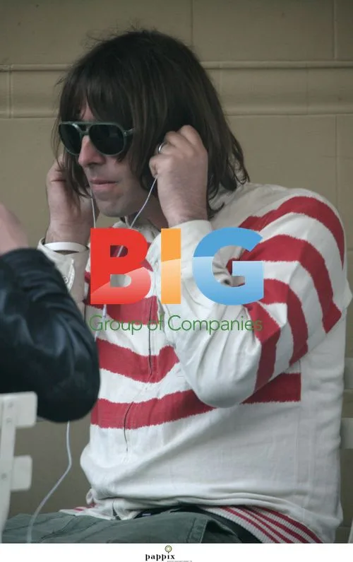 Liam Gallagher relaxing with brother Paul