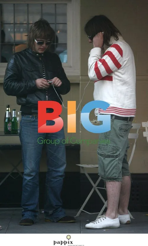Liam Gallagher relaxing with mates and brother