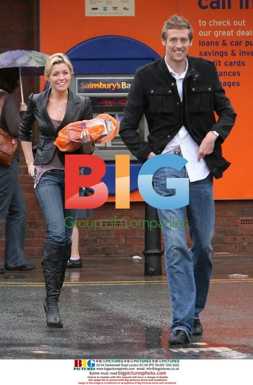 Liverpool's Peter Crouch and Abigail Clancy
