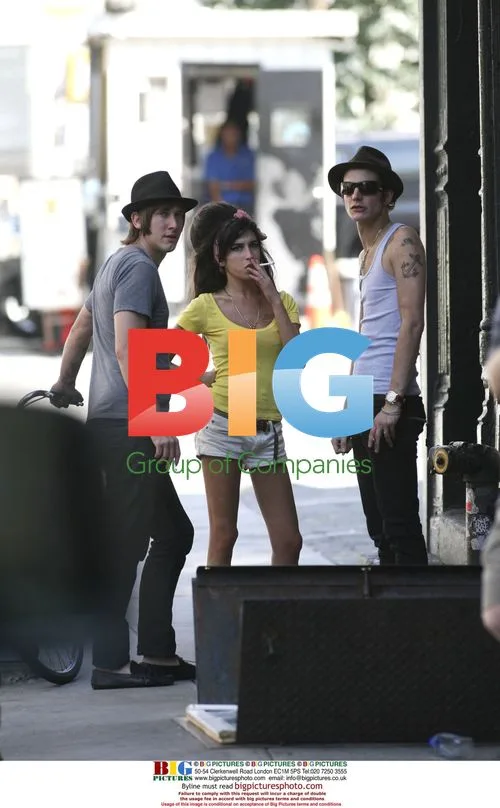 Amy Winehouse and Blake Fielder-Civil Smoking Outside