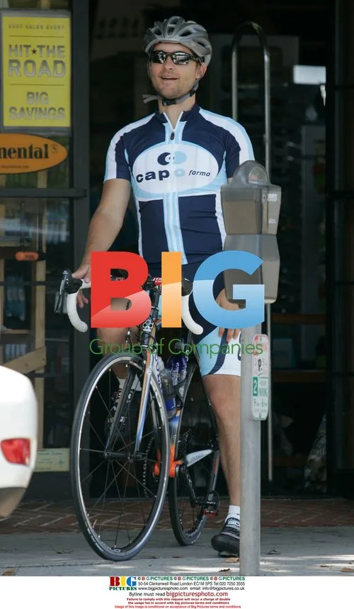 Tobey Maguire rides bike in California