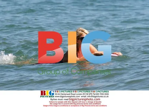 Paris Hilton Boogie Boarding in Malibu