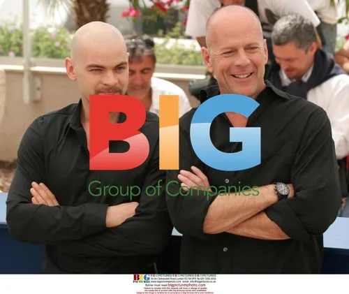 Clovis Cornillac and Bruce Willis at Cannes