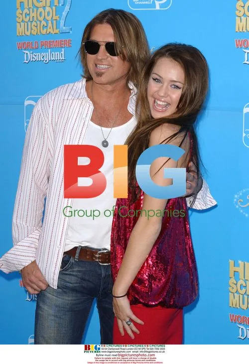 Miley Cyrus and Billy Ray Cyrus at HSM2 Premiere