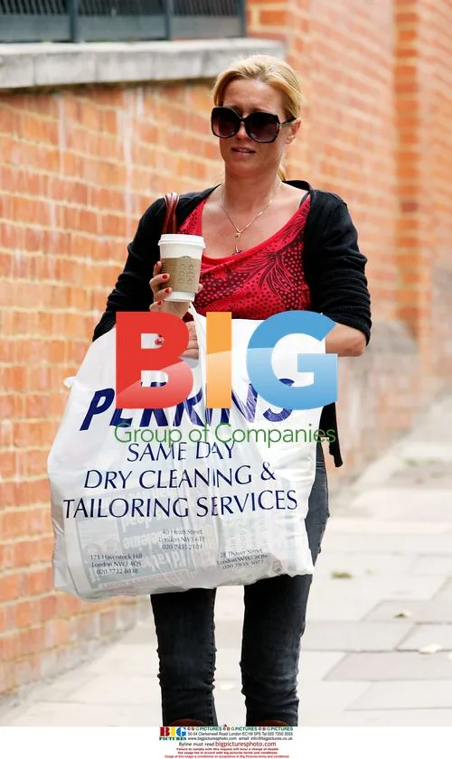 Denise Van Outen returns from shopping in North London