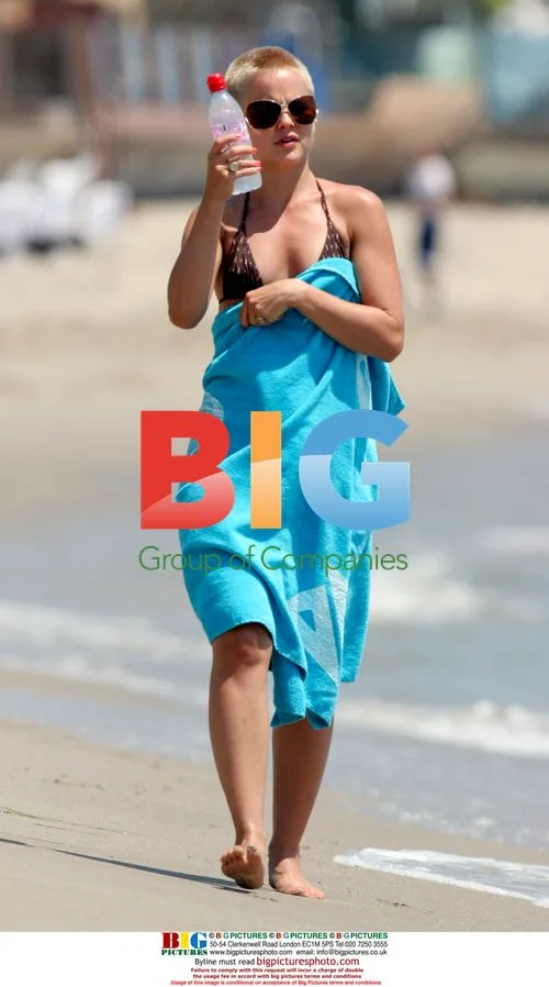 Mena Suvari Covers Up in Malibu