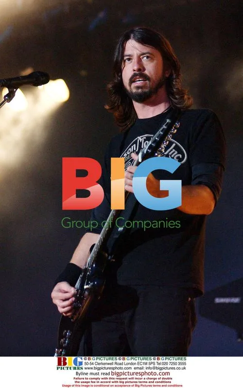 Dave Grohl Escorts Mother to Stage