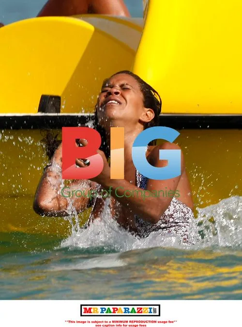 Charley Uchea and Sister on Pedalo