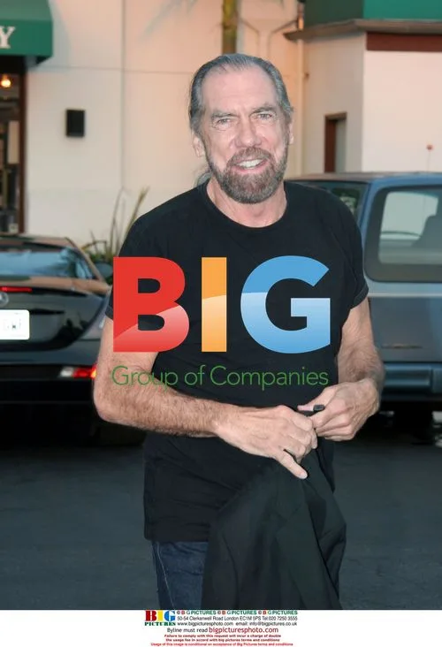 Paul Mitchell Gives Peace Sign