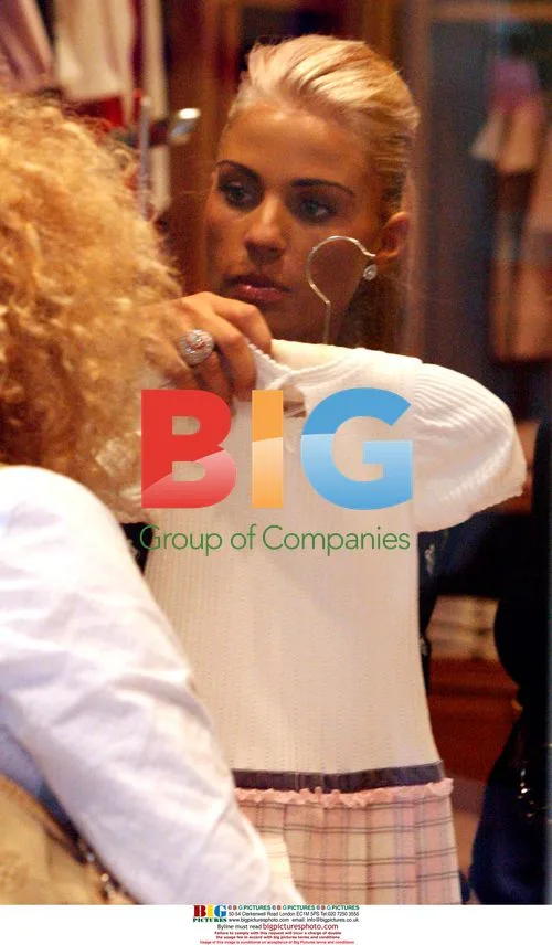Katie Price shops with mom Amy