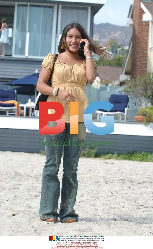 Q'Orianka Kilcher parties on beach in Malibu