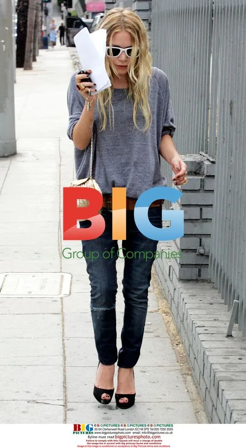Mary-Kate Olsen Flashes Million Dollar Smile