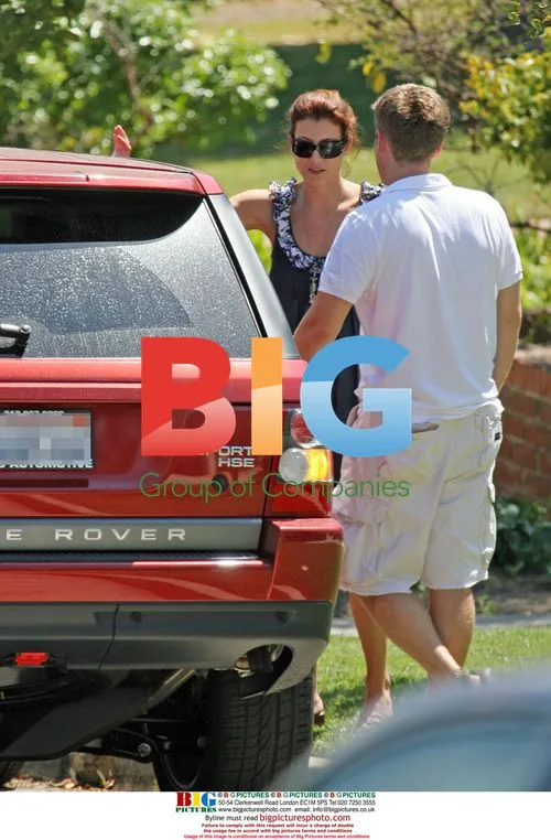 Kate Walsh and fiance Alex Young in heated discussion