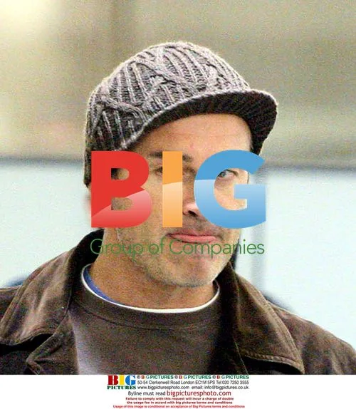 Julian McMahon Departs LAX with Family