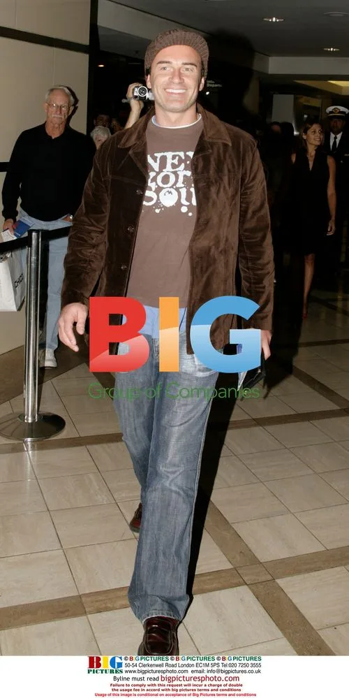 Julian McMahon and Family Depart LAX