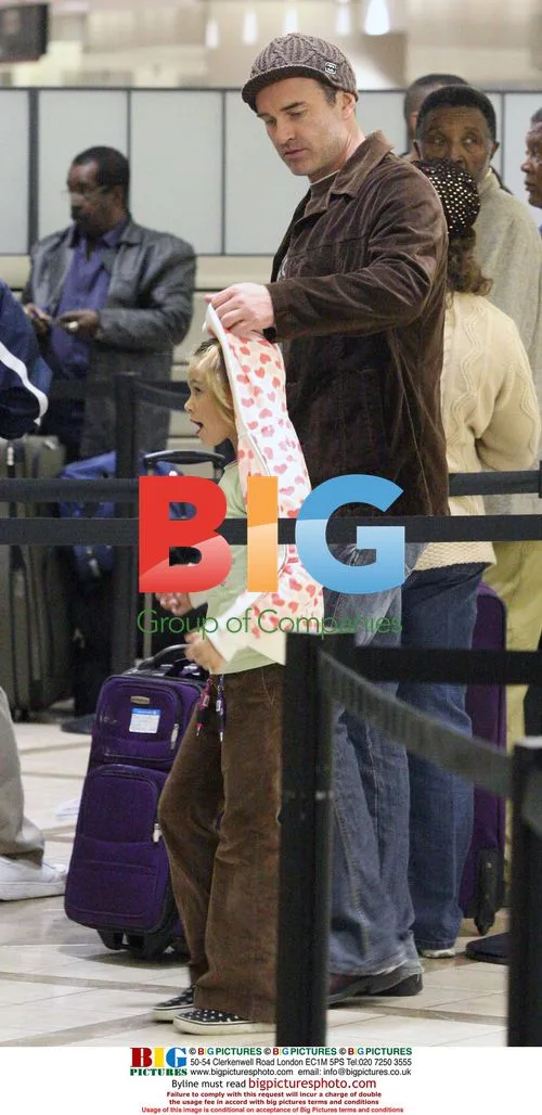 Julian McMahon and Family Depart LAX