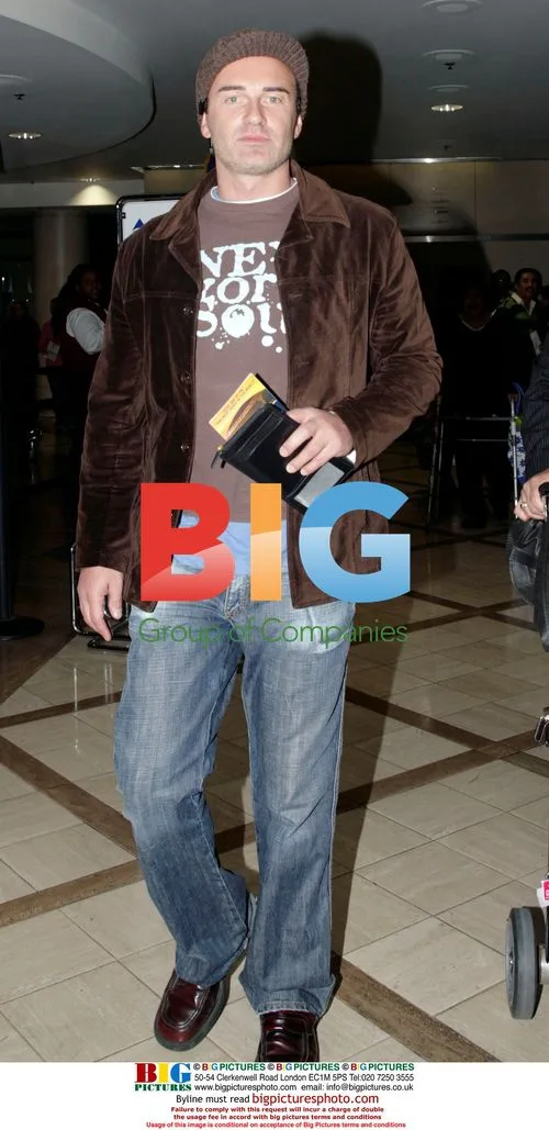 Julian McMahon and Family Depart LAX