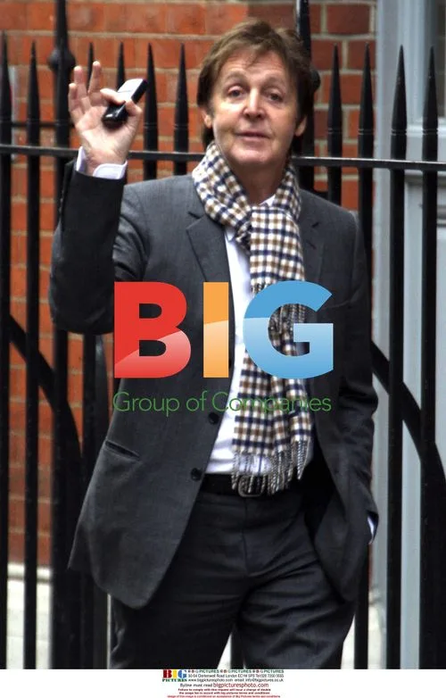 Paul McCartney takes morning stroll in London