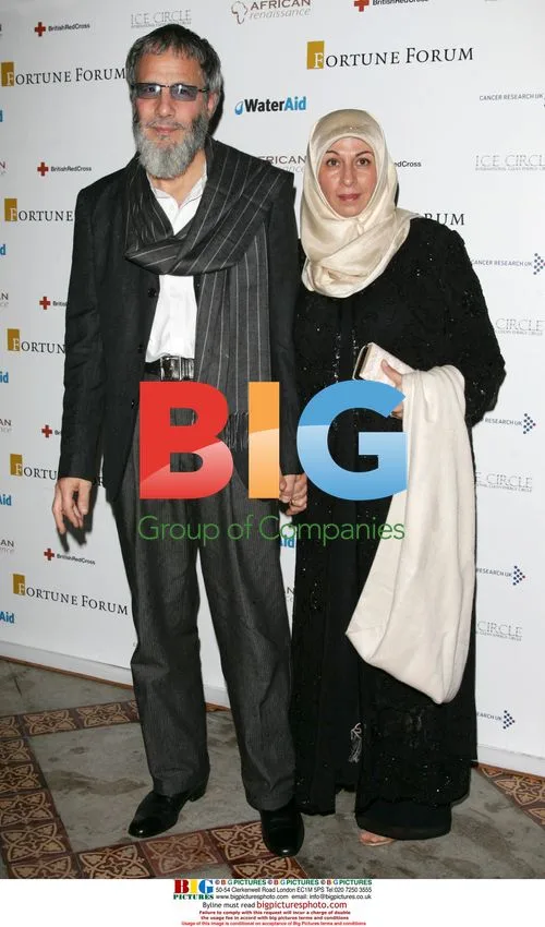 Yusuf Islam and partner at Fortune Forum event