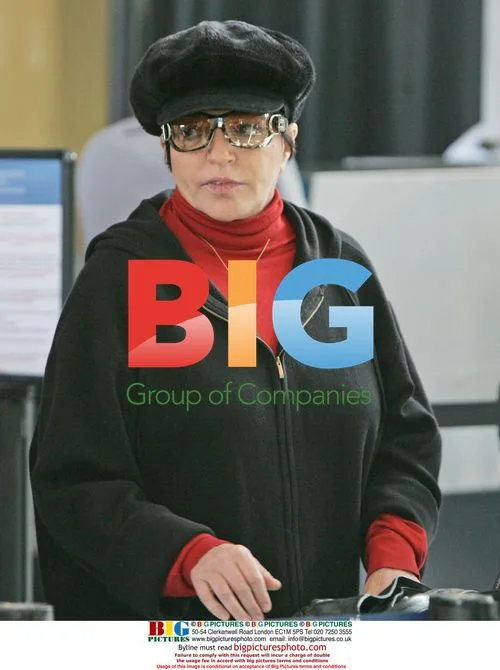 Liza Minelli passes through LAX security