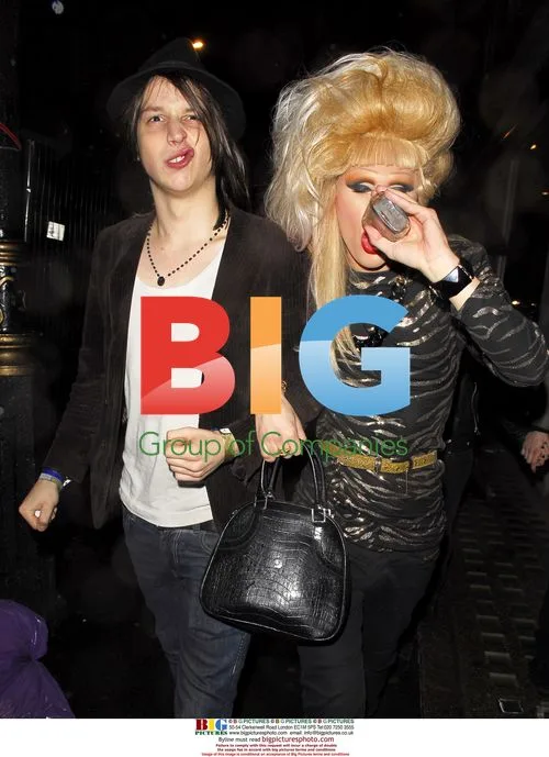 Transvestite DJ Jodie Harsh Drinking Vodka