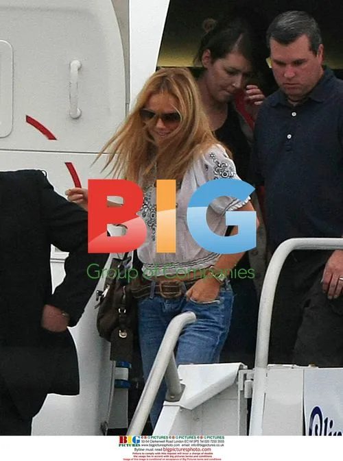 Spice Girls Arrive for Concert with David Beckham