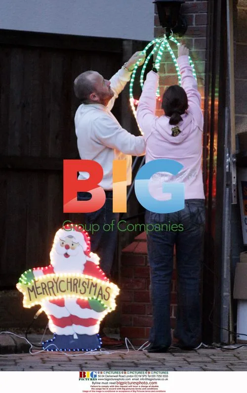 Kerry Croft and Mark Croft decorating home