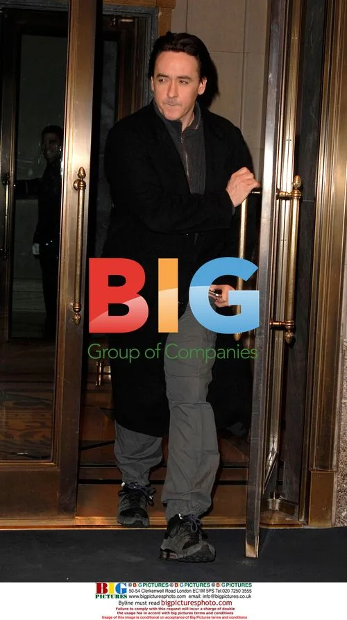 Celebs exit the Ritz Carlton in Midtown