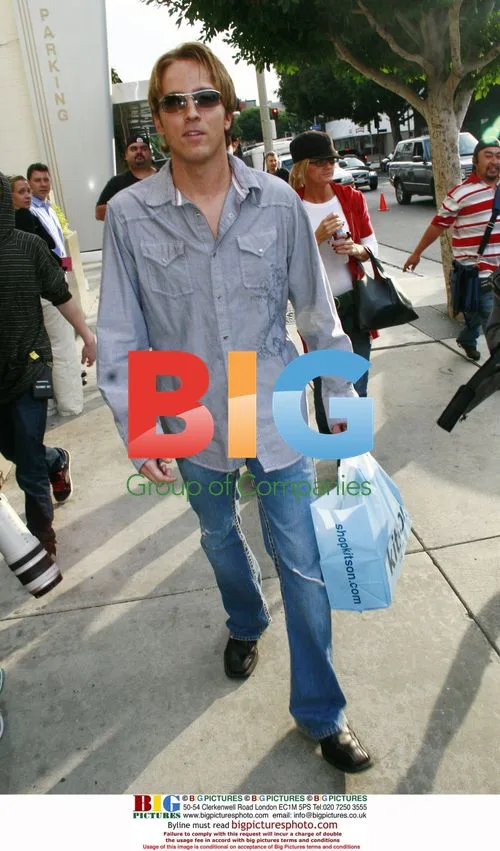 Larry Birkhead Shops at Kitson Boutique