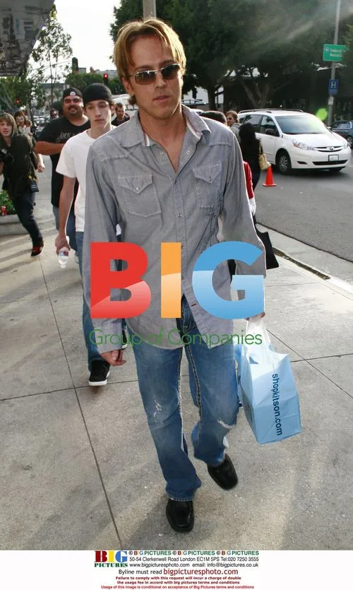 Larry Birkhead shops at Kitson boutique